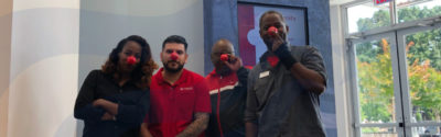 SafeAmerica employees wearing red noses